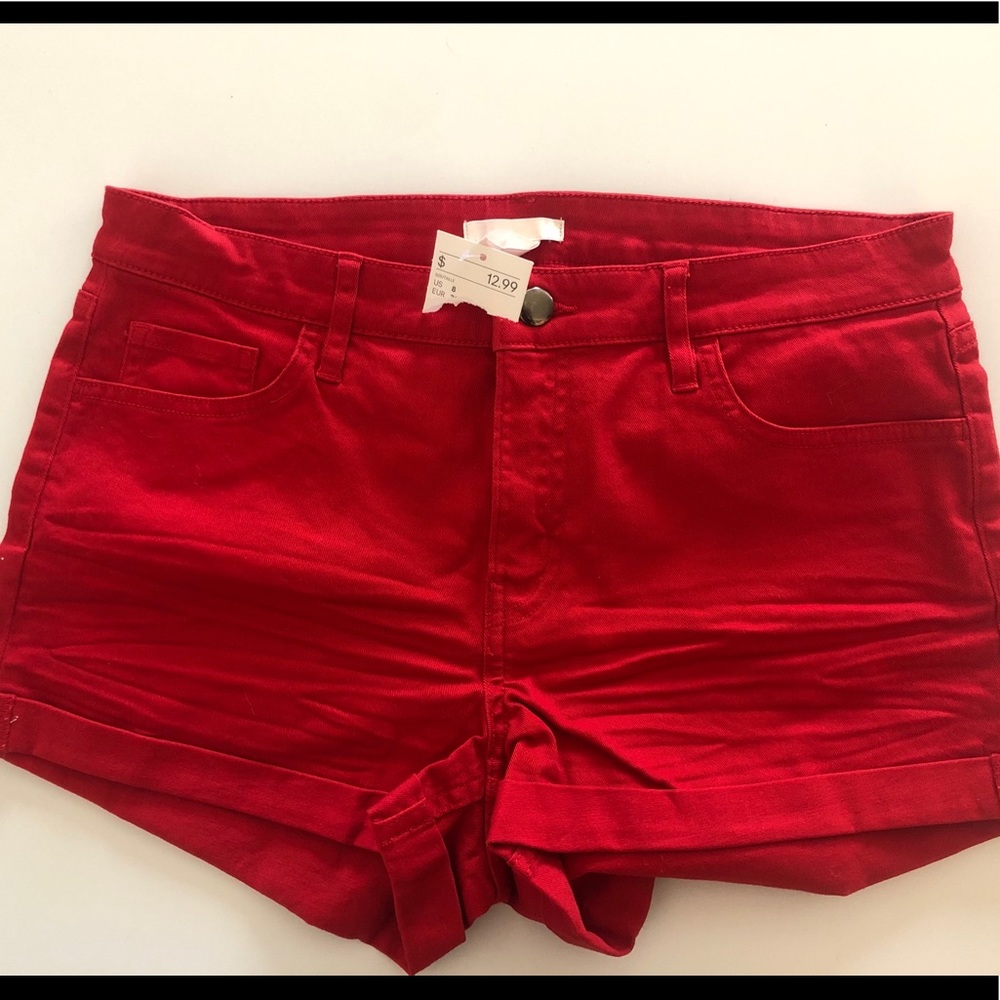 Red H & M shorts